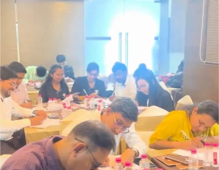 Participants working through exercises during the training
